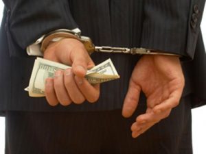 employee-fraud-handcuffs-steal-business